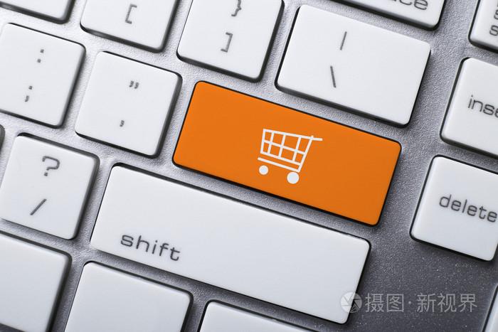 网上购物或网上商店的概念与购物车符号在键盘上